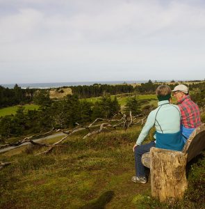 With the Pacific Trails clubhouse and groomed links in the distance